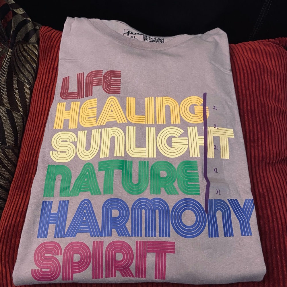 Graphic Tee with Colorful Text by PHluid Project